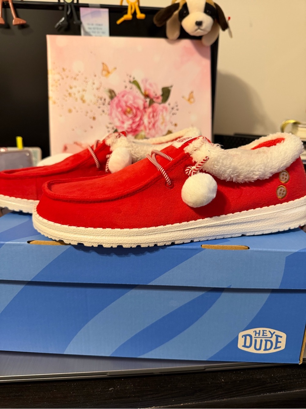 Hey Dude Women’s Wendy Mrs Claus Red Fleece-Lined Pom Pom Slip-On Shoes